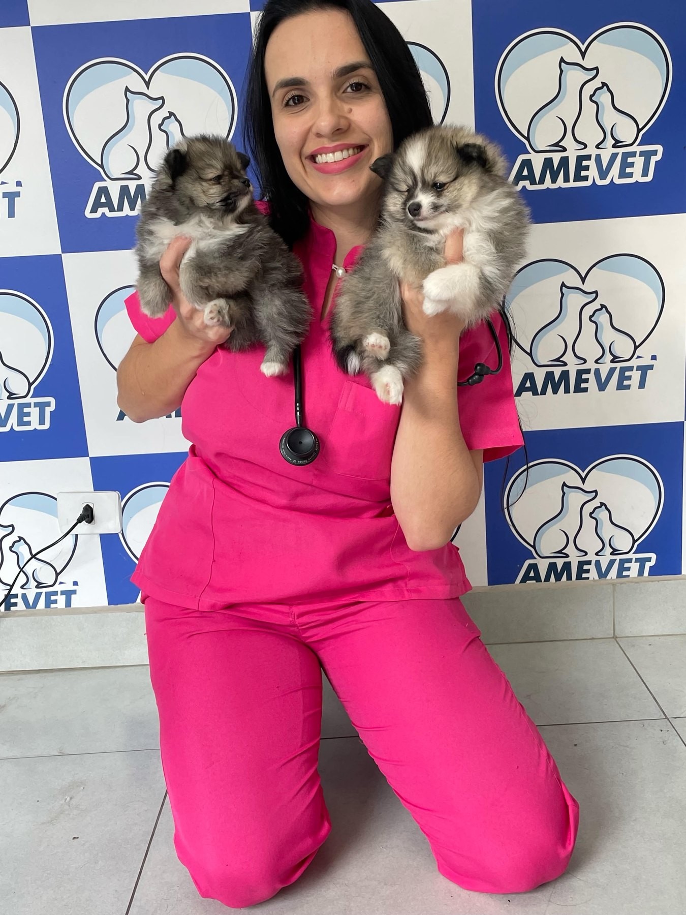 Veterinária com filhotes